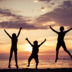 happy children playing on the beach