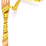 Wooden fork wrapped in centimeter, concept of lose weight and healthy lifestyle