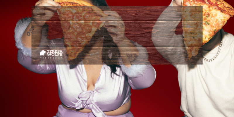 Two women, each holding up a large slice of pizza in front of their face, so you cannot see their faces. Message: Your feelings guide your food choices. Awareness of your emotional eating triggers can help you to transform your eating habits.